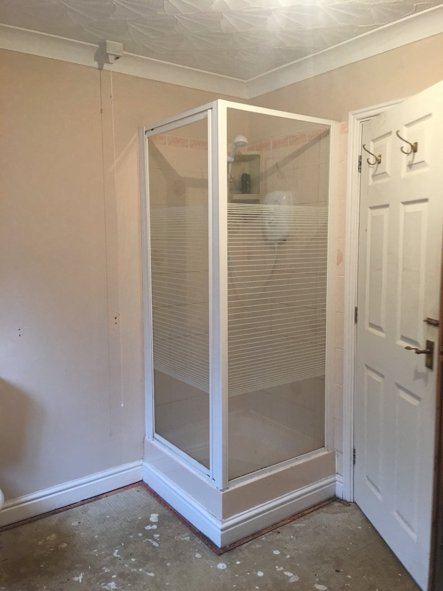 image shows: bathroom refurbishment corner bath joys green 