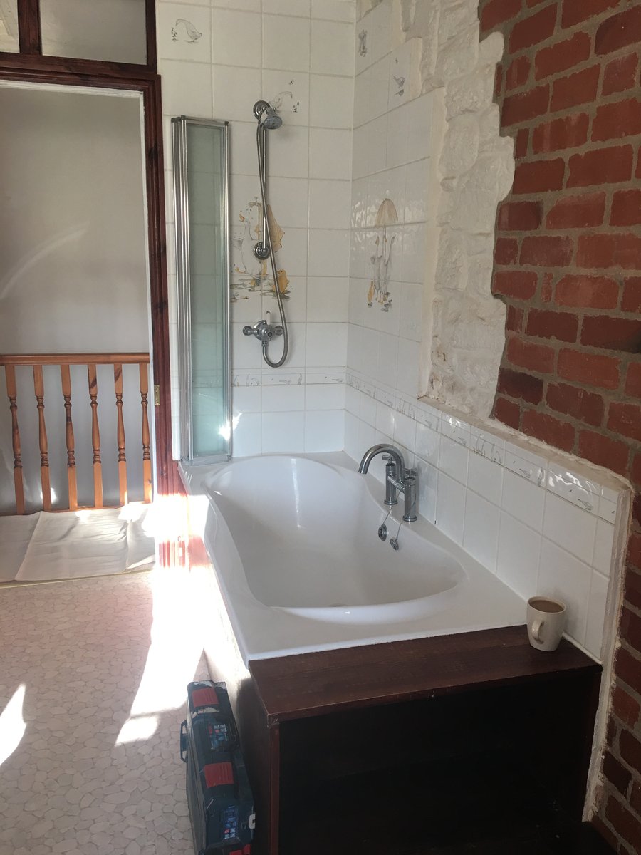 image shows: bathroom renovation stone floor mork 