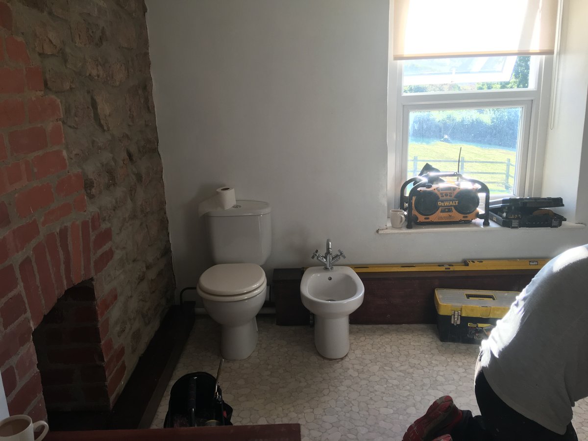 image shows: bathroom renovation stone floor mork 