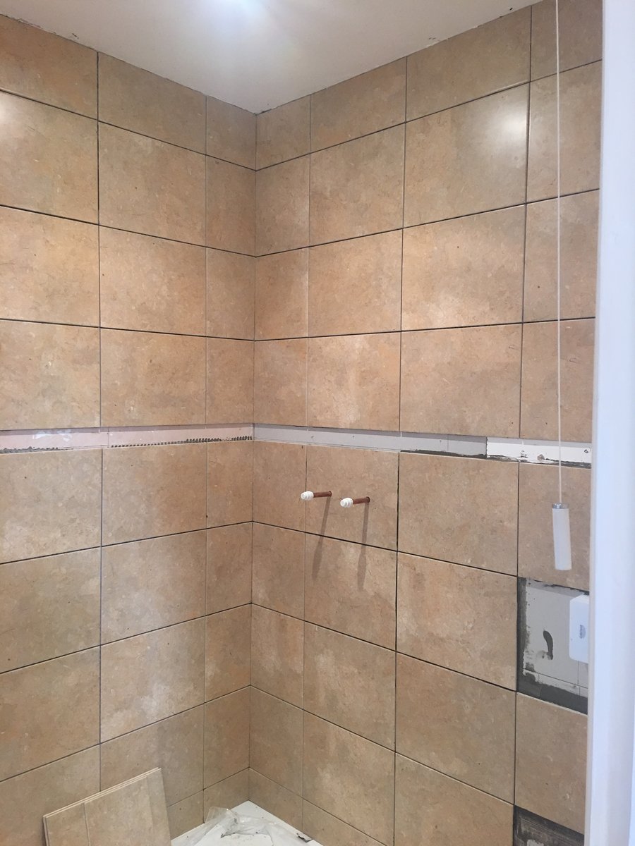 image shows: bathroom renovation stone floor mork 