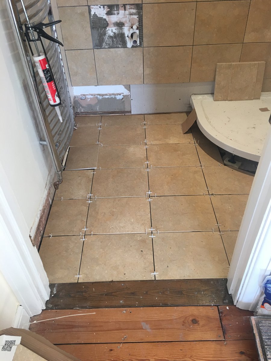 Image of bathroom renovation stone floor mork 