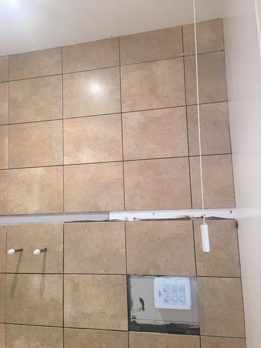 image shows: bathroom renovation stone floor mork 