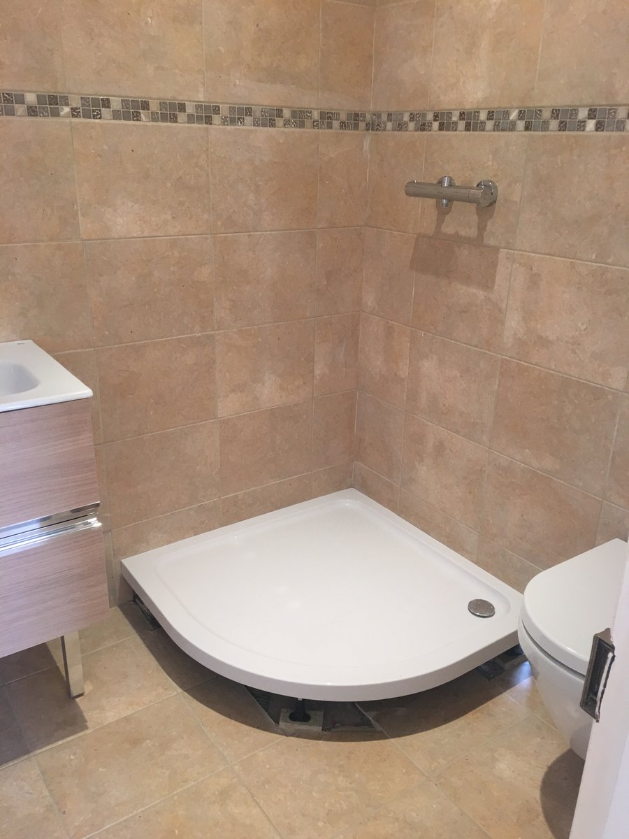 image shows: bathroom renovation stone floor mork 