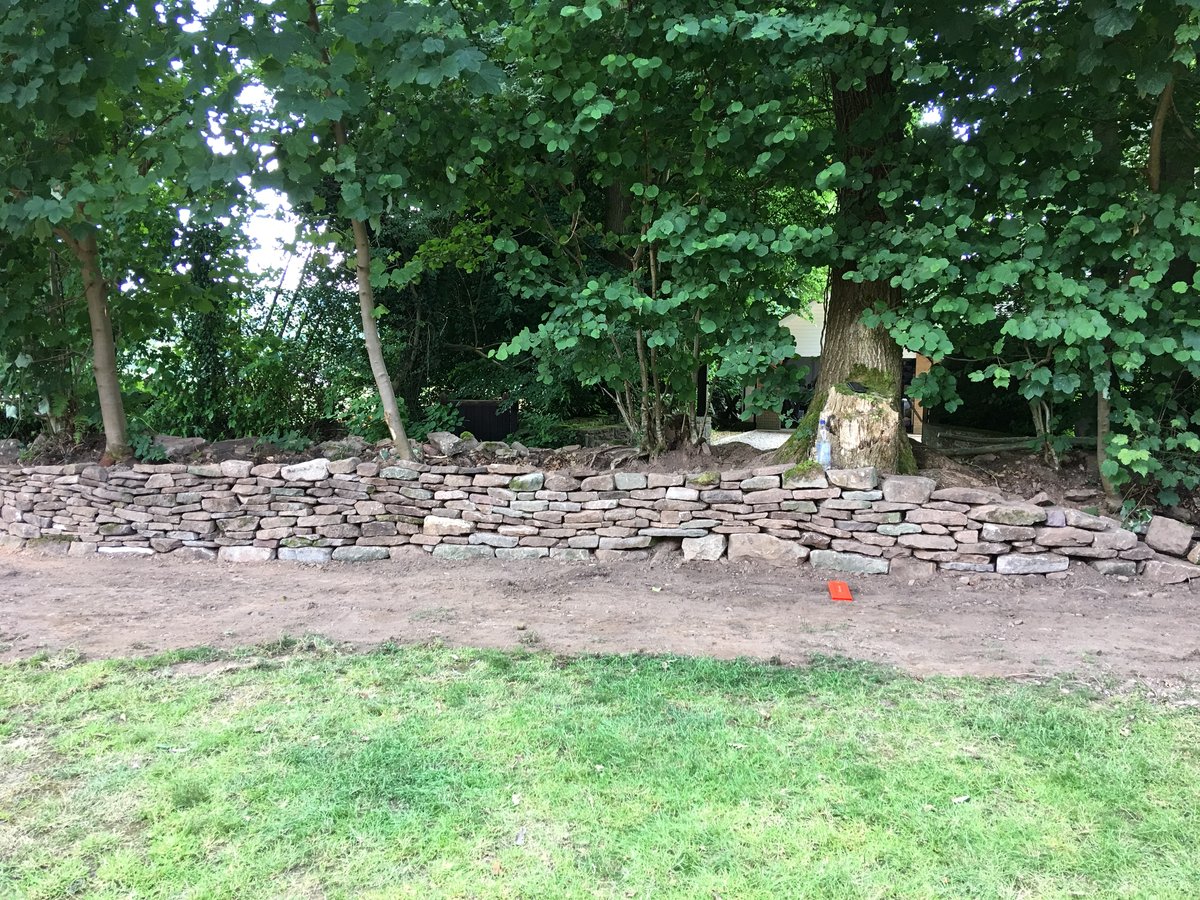 Image of dry stone walling repairs the narth 