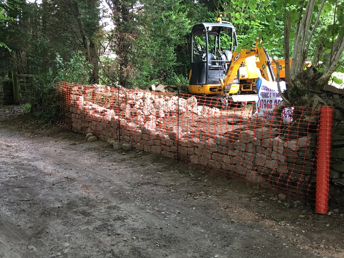 image shows: dry stone walling repairs the narth 