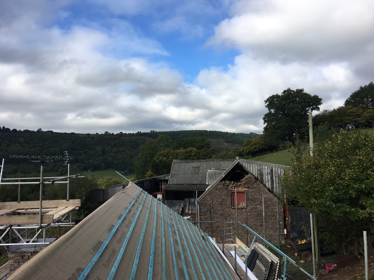 image shows: farmhouse slate roof replacement cwmyoy 