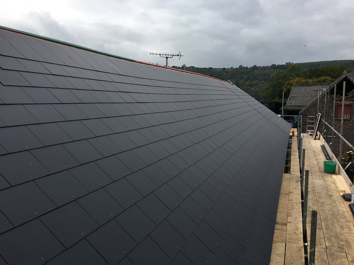 image shows: farmhouse slate roof replacement cwmyoy 