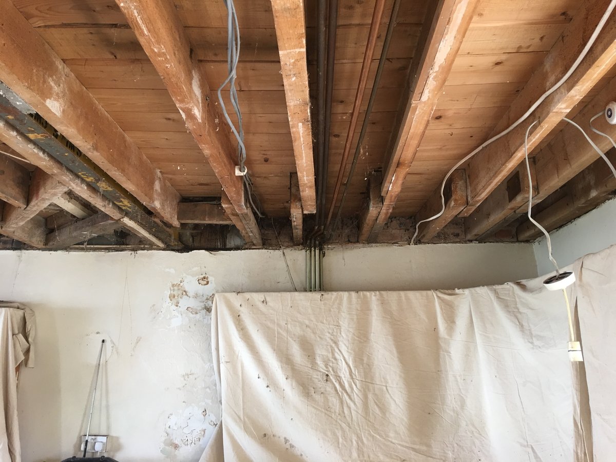 image shows: floor joist repair plasterboard skim 