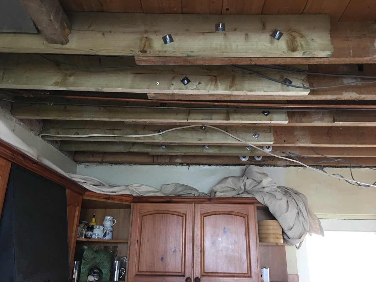 image shows: floor joist repair plasterboard skim 