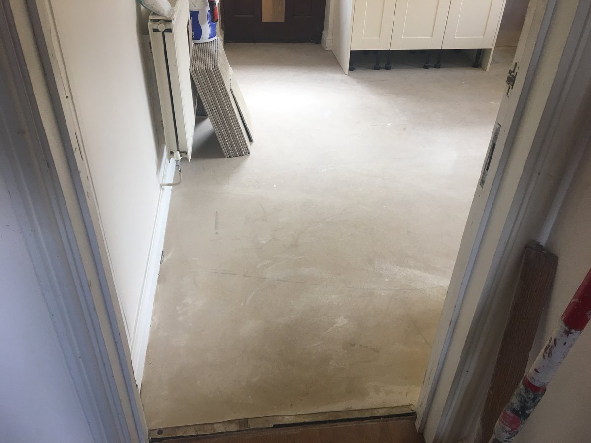 image shows: kitchen floor wall stone tiling joys green 