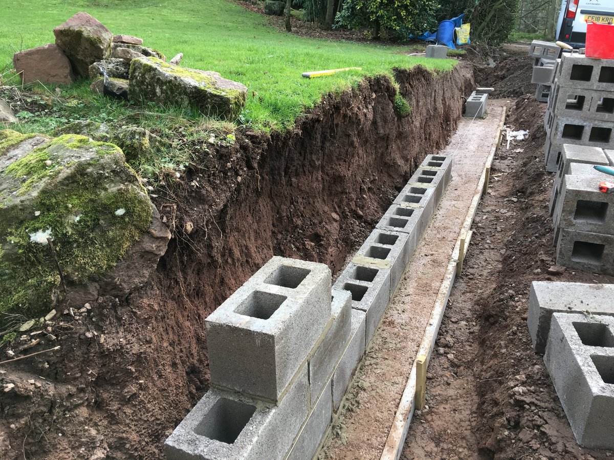 image shows: new retaining wall st briavels common 