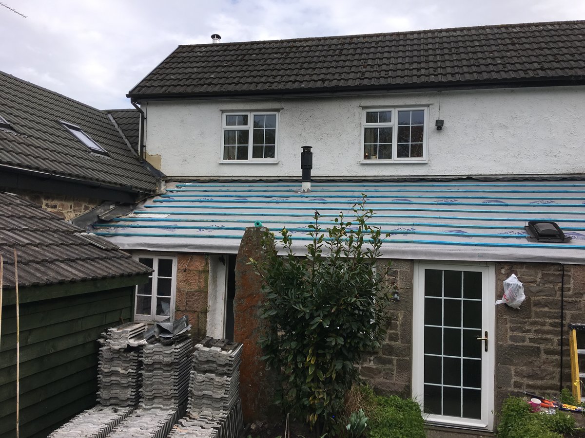 image shows: new roofing felt and battens velux window cleddon 