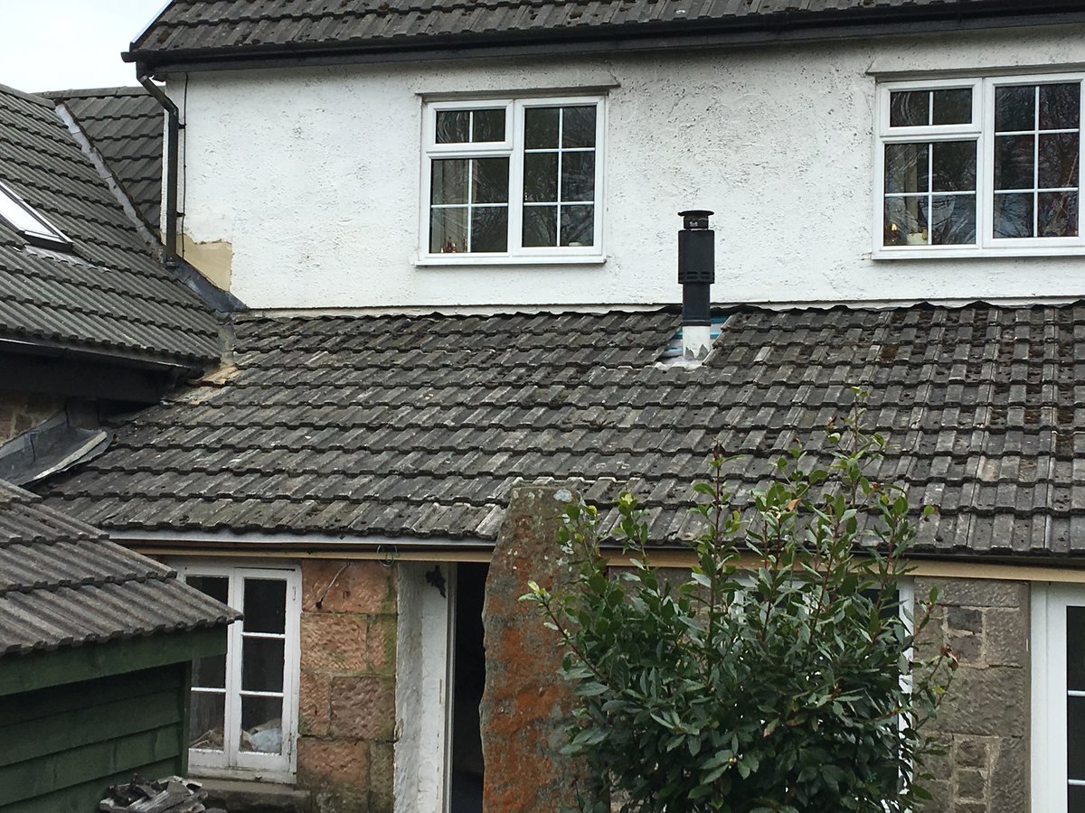 image shows: new roofing felt and battens velux window cleddon 