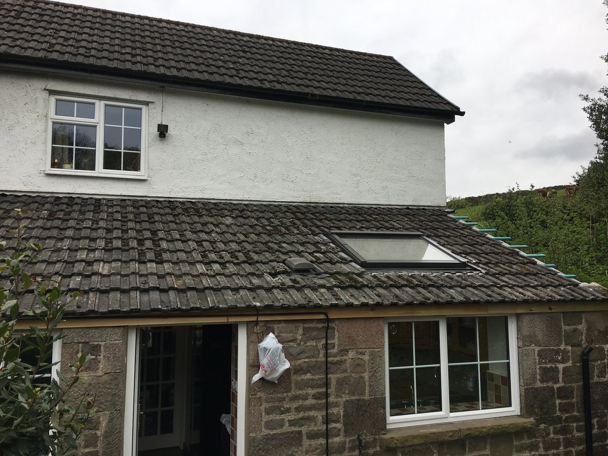 image shows: new roofing felt and battens velux window cleddon 