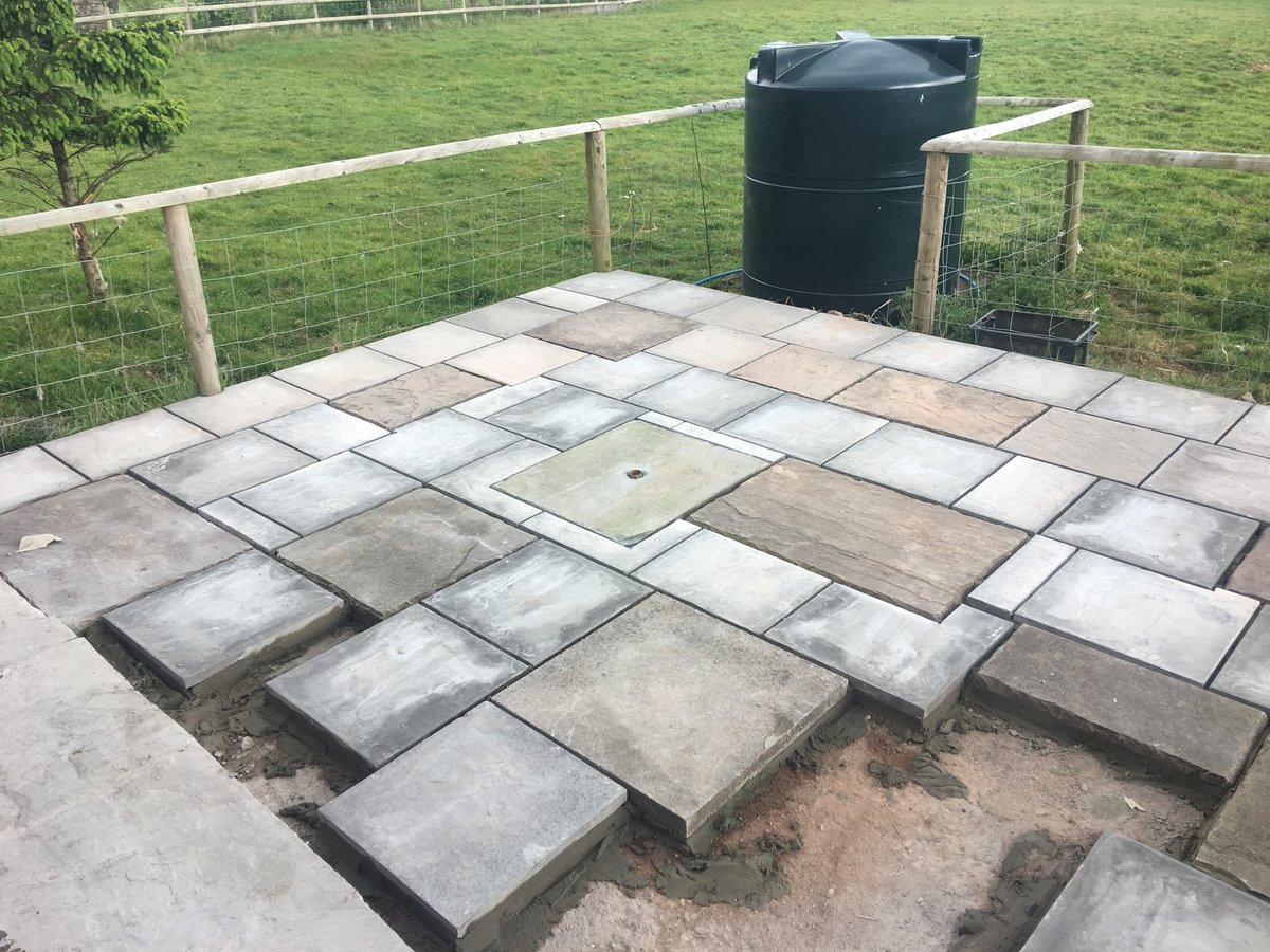 image shows: patio using mixed new old slabs trellech grange 