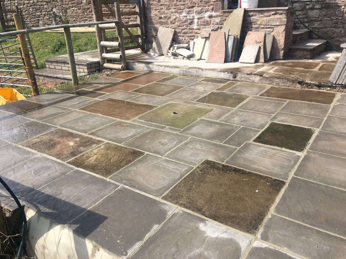 image shows: patio using mixed new old slabs trellech grange 