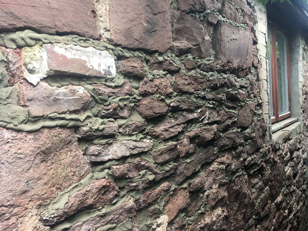 image shows: pointing rendering old stone wall 