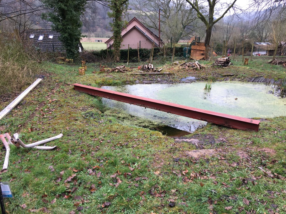 image shows: pond corner decking llandogo school 