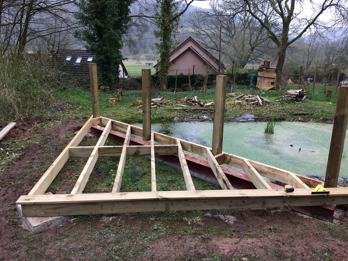 image shows: pond corner decking llandogo school 