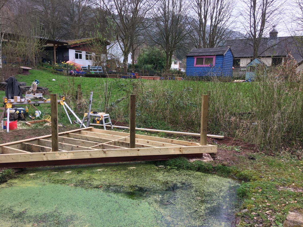 image shows: pond corner decking llandogo school 