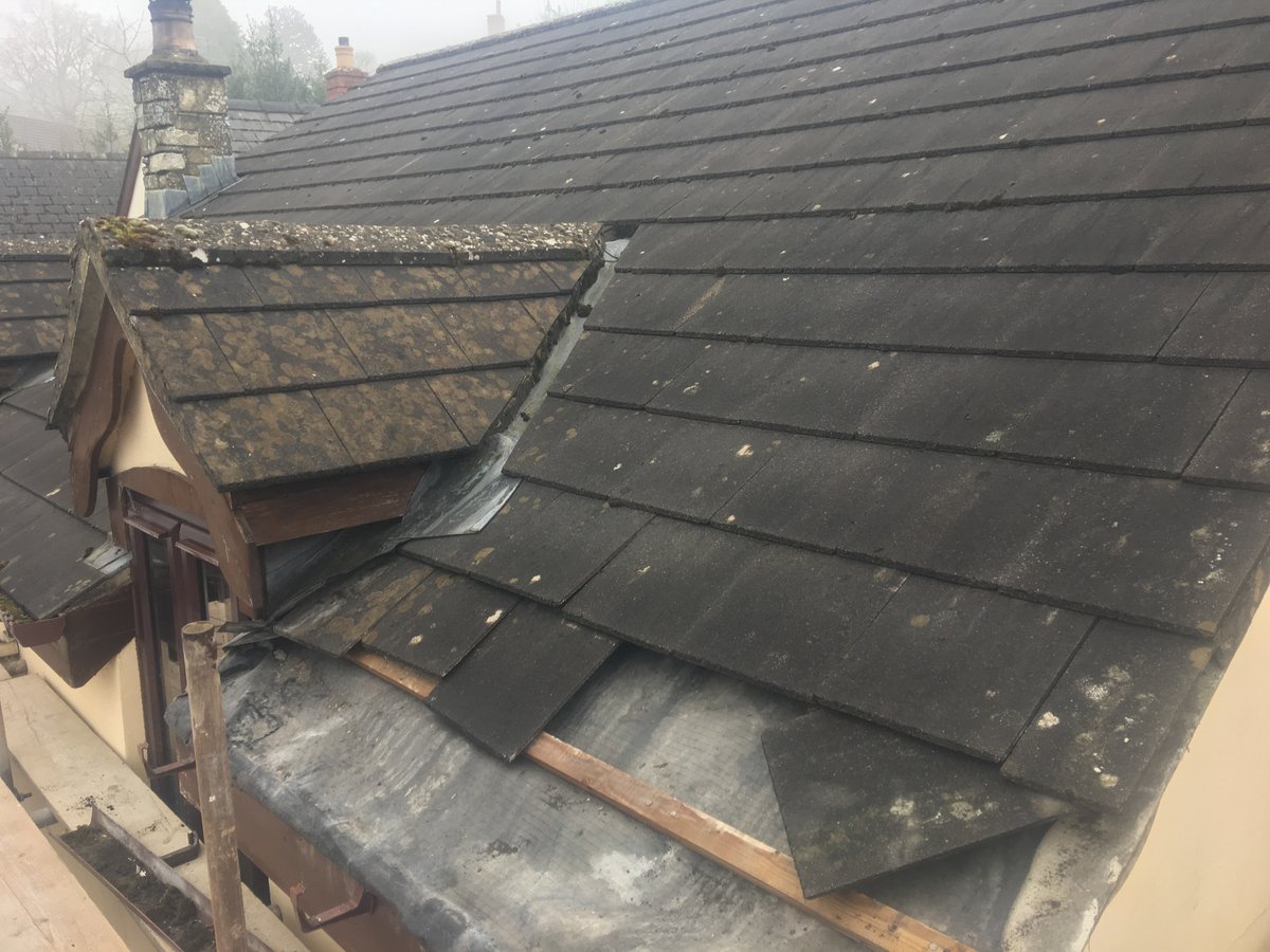 Image of roof replacement using existing tiles bury hill 