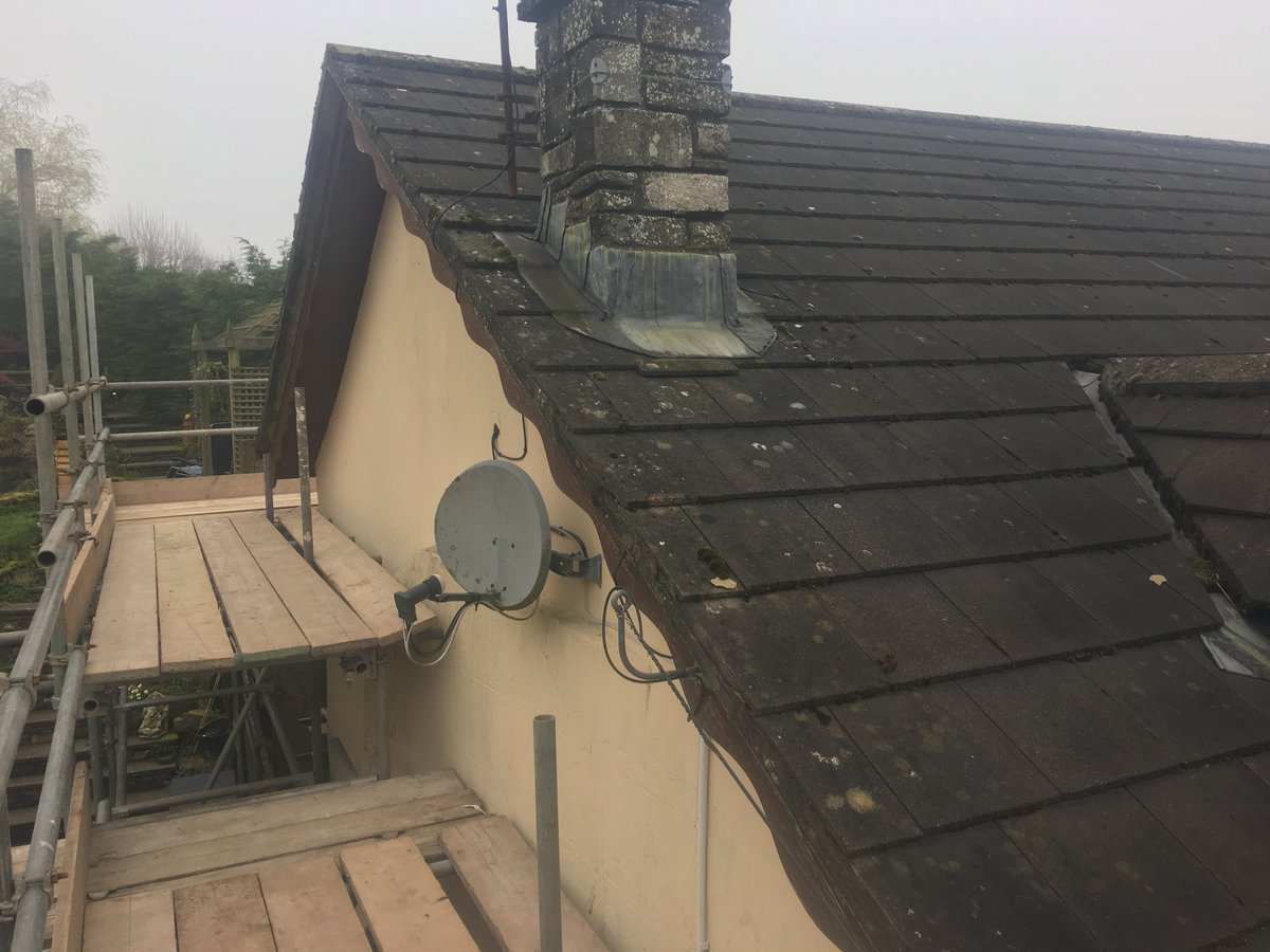 image shows: roof replacement using existing tiles bury hill 