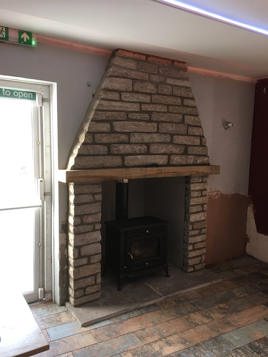 image shows: somerset arms removep window replaced with log burner dingestow 