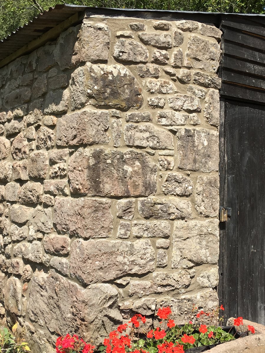 An image of walls repointed patio slabs relaid mork  goes here.