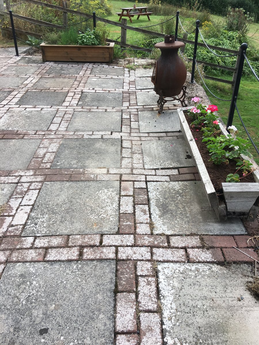 An image of walls repointed patio slabs relaid mork  goes here.